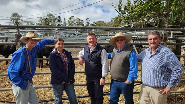 Richie Williamson and Dugald Saunders with local farmers, Robbie Sutherland and his grandson George Robert Sutherland (far left) and Emma Rogers at the Grafton Regional Livestock Selling Centre.