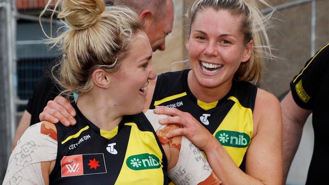 Jess Hosking and Katie Brennan celebrate after the Tigers secured the double chance for the AFLW finals series. Picture: Dylan Burns/AFL Photos via Getty Images