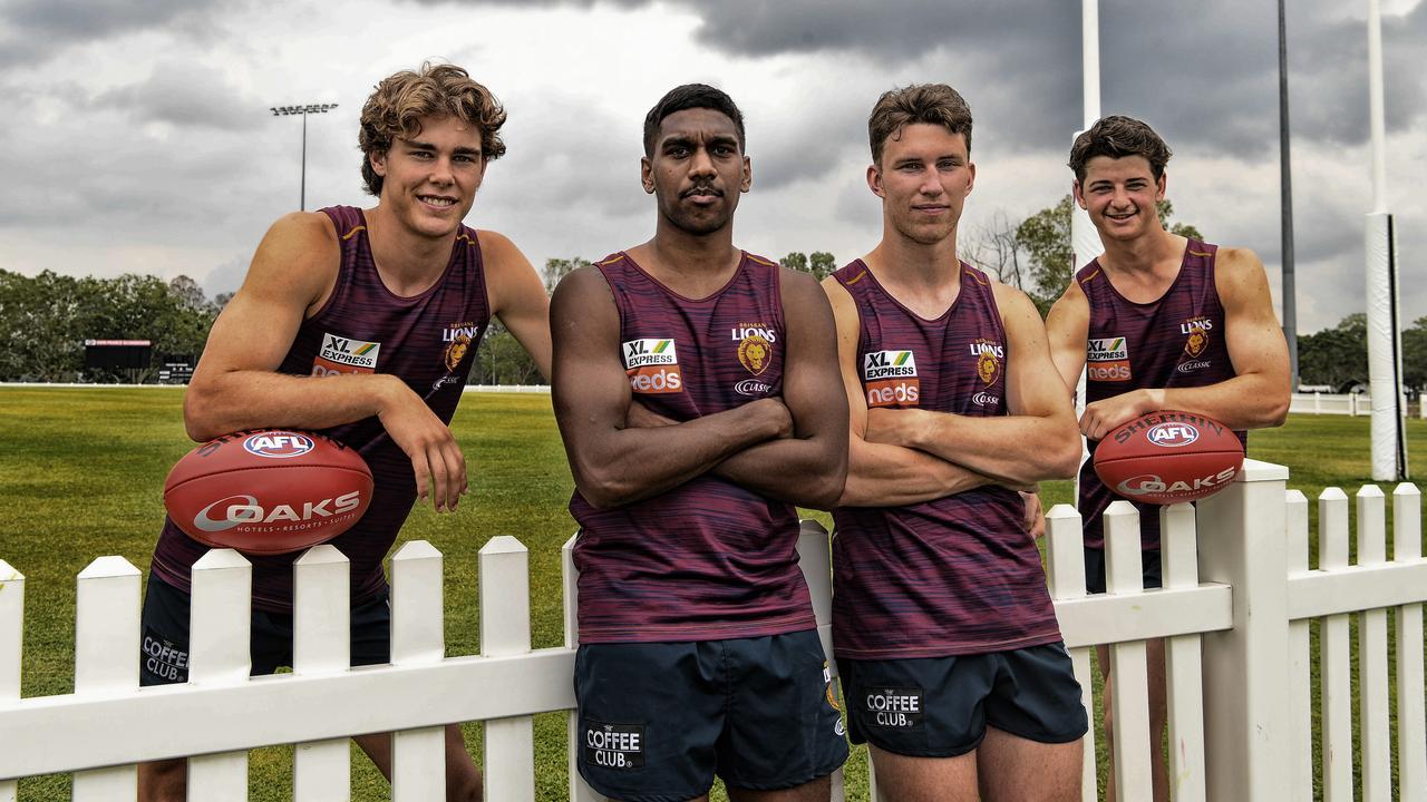 Deven Robertson (left) with Lions draftees Keidean Coleman, Brock Smith and Jaxon Prior.