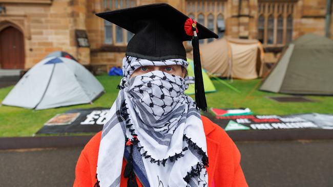 A protester with a Palestinian scarf. Picture: NCA NewsWire / David Swift