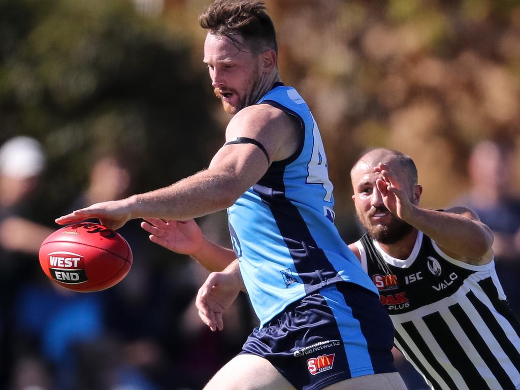 25/4/18 SANFL: Sturt v Port Adelaide at Unley Oval. Aiden Riley of Sturt tackled by Josh Simpson of the Magpies Picture MATT TURNER.