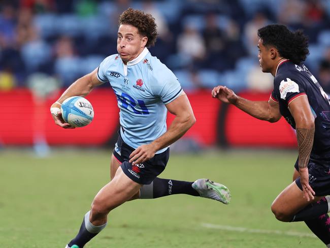 SYDNEY, AUSTRALIA - MARCH 29:  Mark Nawaqanitawase of the Waratahs runs with the ball during the round six Super Rugby Pacific match between NSW Waratahs and Melbourne Rebels at Allianz Stadium, on March 29, 2024, in Sydney, Australia. (Photo by Matt King/Getty Images)