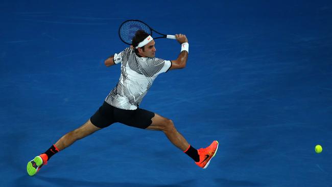 Roger Federer in action vs Rafael Nadal.