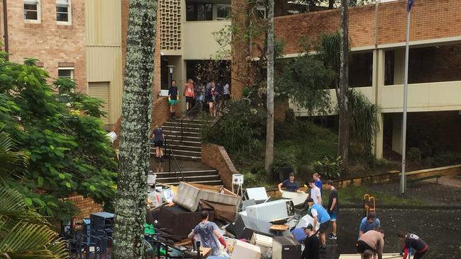 Flood clean up effort Trinity Catholic College, Lismore.