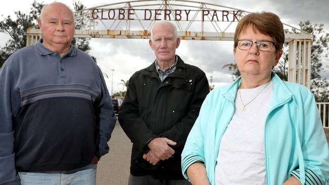 Former SA Harness Racing Club committee members (from left) Des Farrow, Bob Stanley, and Lynne Copeland at Globe Derby Park. Picture: Dean Martin