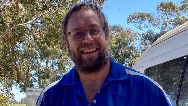 Mundoona's Simon Happy has been charged with historic sexual abuse.