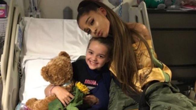 Ariana Grande visits with eight-year-old Lily Harrison a victim of the Manchester Arena bombing which left 22 people dead. Picture: Twitter