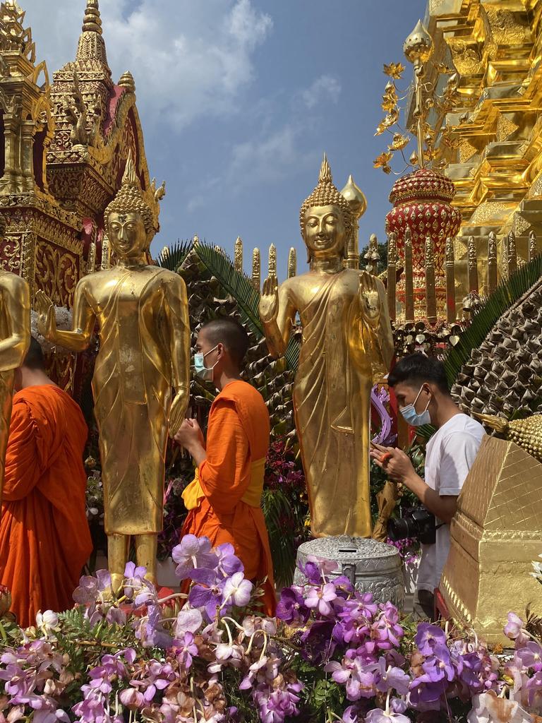 Mindful monks at Wat Phra That Doi Suthep.