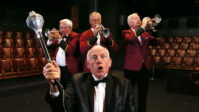 Wayne Rees pictured with the Cairns Municipal Band in 2021 during the run of Brassed Off, which he directed. Picture: Brendan Radke