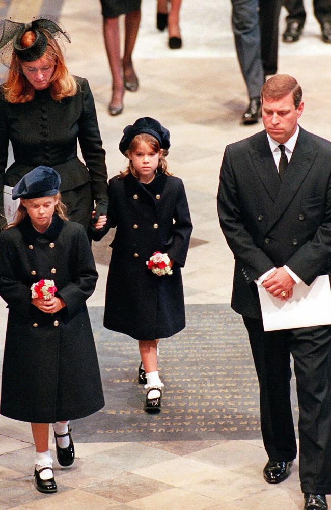 The Duchess of York, Sarah Ferguson, her former husband Andrew, the Duke of York, and their two daughters Beatrice and Eugenie arrive into Westminster Abbey in London to attend the funeral ceremony of Diana, Princess of Wales. Picture: AFP