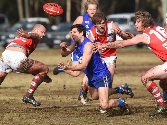 Nepean FNL: Hastings v Sorrento at Thomas Barclay oval , Hastings. Hastings midfielder #21 Dale Alanis fires out a quick handball. Picture: Chris Eastman