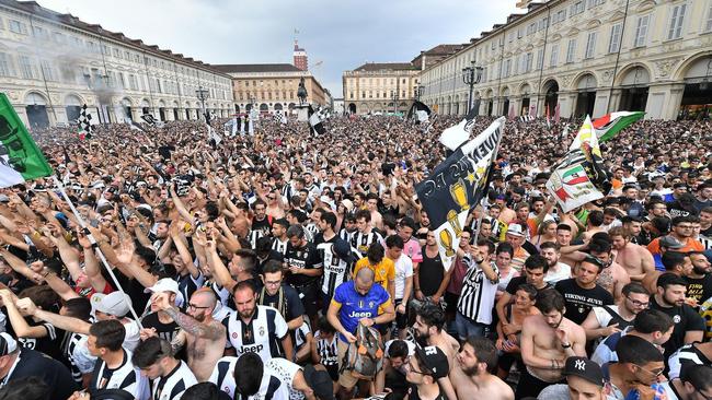 Juventus' fans gather in San Carlo's square