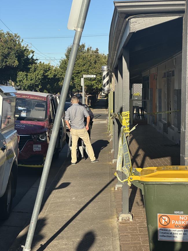 Police tape cordoned off the business while award-winning Banana Boogie Bakery continued to sell coffees. Picture: Sam Lowe