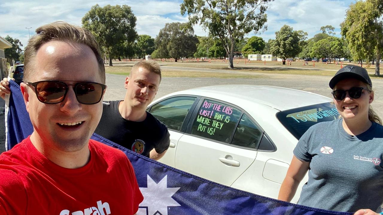 CFMEU lawyer Peter Russell (centre) campaigning with “Ash the Ambo” (right) during the 2022 SA election. Source: Facebook