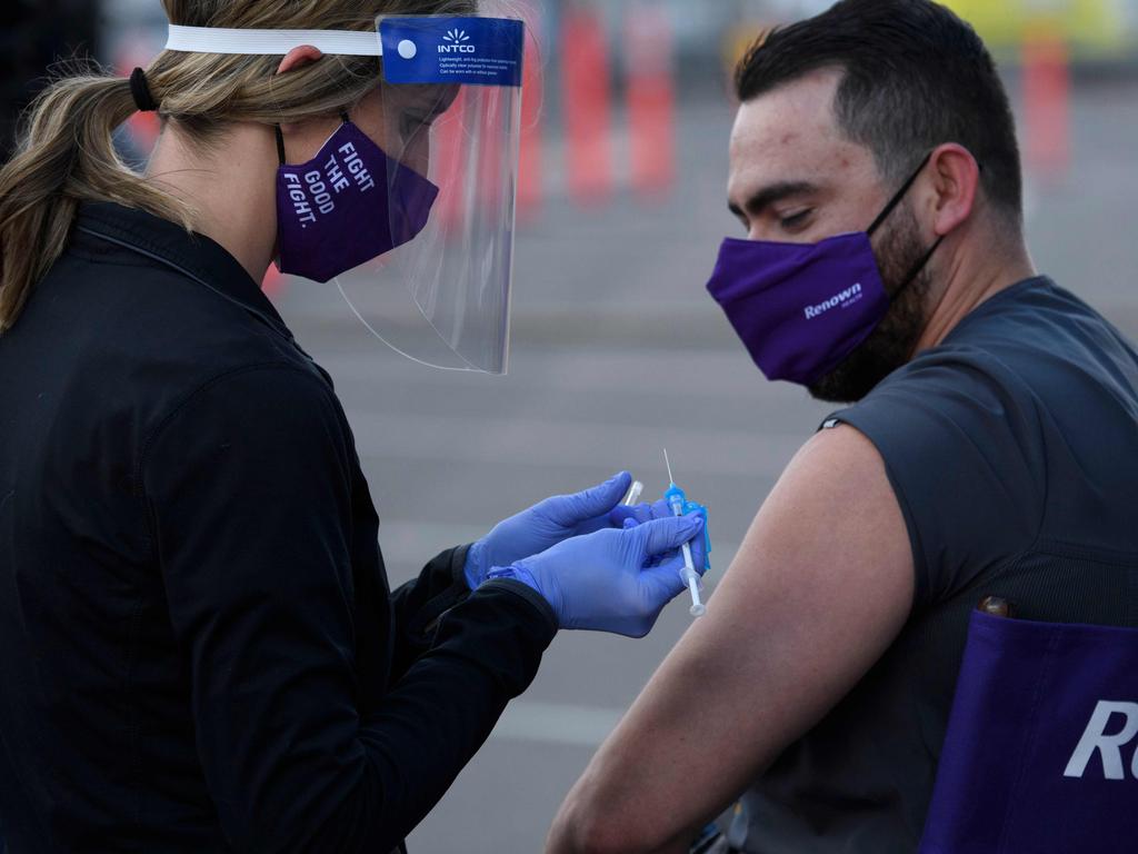 The UK and US have both authorised emergency use of the Pfizer vaccine, but Prof Kelly says Australia won’t follow suit. Picture: Patrick T. Fallon/AFP