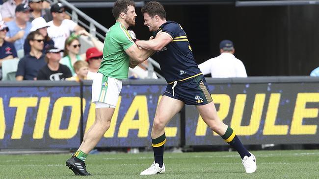 Patrick Dangerfield and Chris Barrett come to blows during the International Rules Series at Adelaide Oval. Picture: Sarah Reed