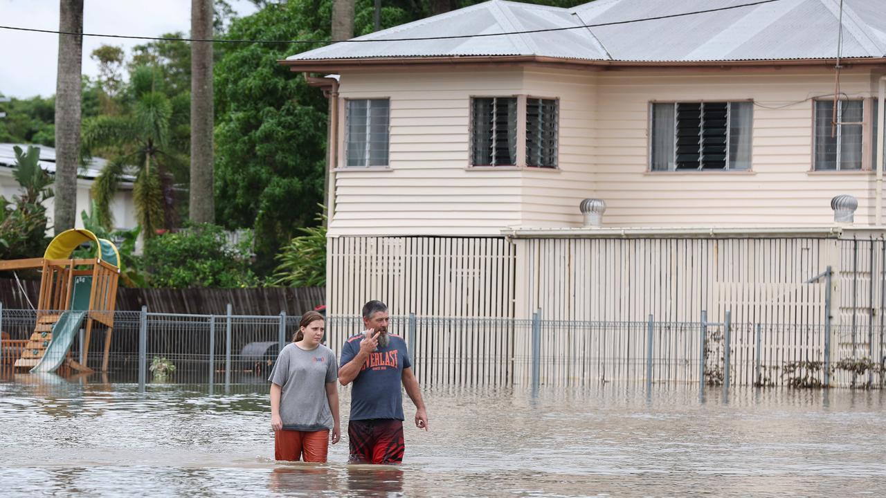 Premier of Queensland David Crisafulli crosses the Ollera Creek which has been destroyed by flood water so he can make his way into Ingham (pictured). Pics Adam Head