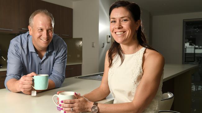 Meagan and Leon Jacobsen work with a financial planner. Picture: Tricia Watkinson