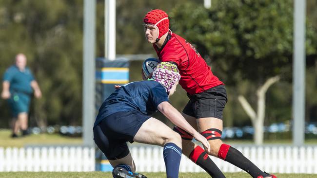 Xavier Grambower is tackled by Jack Willson in the GPS 1st XV Rugby game between Brisbane Grammar and Gregory Terrace at Northgate, Saturday, July 30, 2022 - Picture: Richard Walker