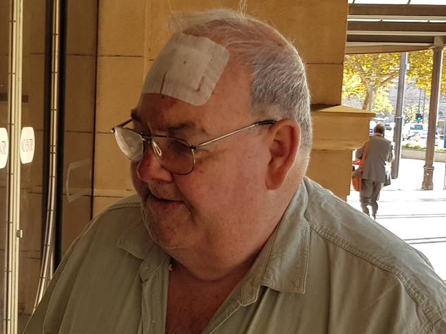 Accused murderer Peter Rex Dansie returns to the Supreme Court in Adelaide after suffering injuries when he fell over after a view of the scene of his alleged crime. Picture: Sean Fewster