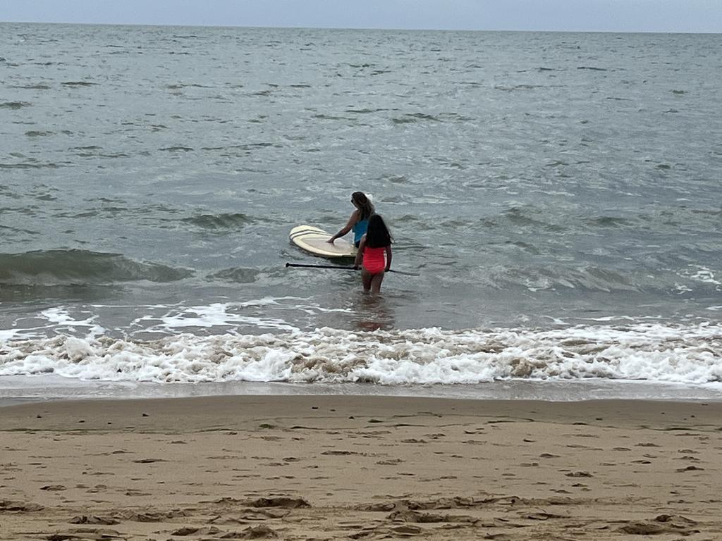 A paddle out held in the waters off Torquay beach in memory of Tash Raven.