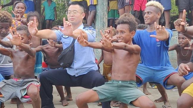 Chinese police demonstrating martial arts to children in Solomon Islands. Picture: Facebook