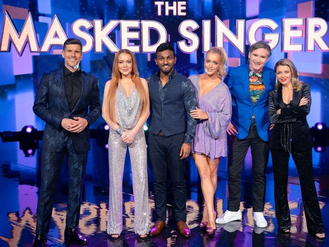 The Masked Singer host Osher Gunsberg with guessing panellists Lindsay Lohan, Nazeem Hussain, Jackie O, Dave Hughes and Dannii Minogue.