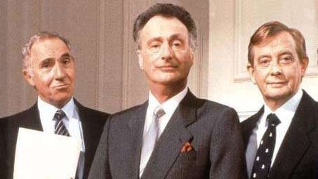 Actors (L-R) Nigel Hawthorne, Paul Eddington and Derek Fowlds in TV show 'Yes, Minister'.