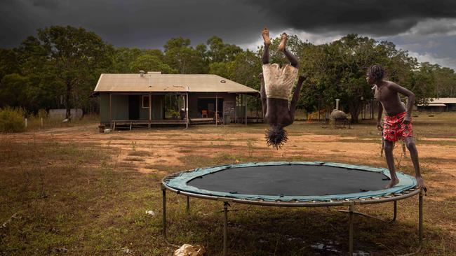 Children play in front of the Gamardi Homeland Learning Centre. Picture: Rebecca Parker