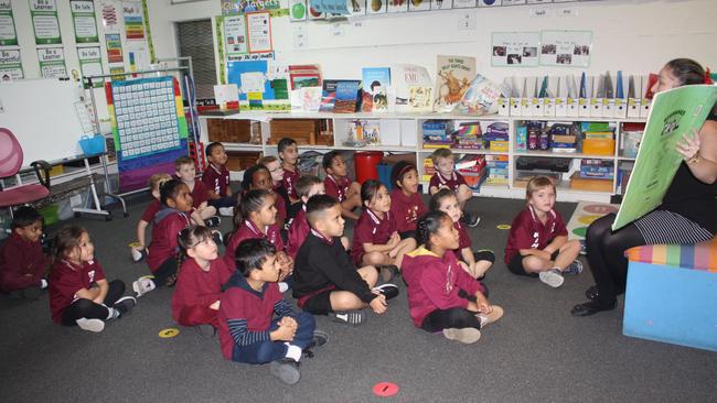 PREP H: Mrs Huni reading a book to Prep H. Daniel Abraham, Coleman-Nelson, Brooklyn Cook, Tyson Ellison, Justice Fa’afoi, Soteria Faletui, Allison Forrest, Annie Gray, Anastacia Hassen, Zakir Henry, Seth Kaivelata, Sovereign Kolo, Queenie-Mae Mahoro, Abigail Mattner, Connor McNellee, Mylah Morganson, Salome Omthang, James Patu Uritaua, S J Smyth, Jiordan Tau, Sunshine.