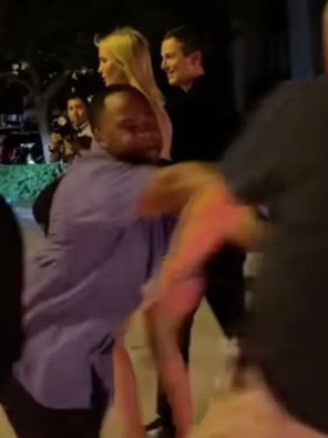 The agent pushed the man back when he got too close. Picture: miamibeachexperience/TikTok