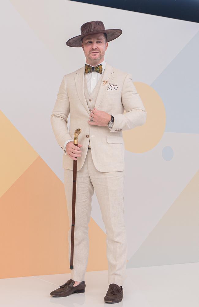 This gentleman elected to accessorise with a cane. Picture: NCA NewsWire / Flavio Brancaleone