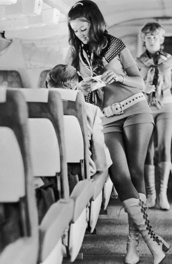 circa 1972: Stewardesses working for Southwest Airlines of Texas must be able to wear hot pants and kinky leather boots or they don't get the job. In accordance with the airline's motto, 'sex sells seats' interviewees are selected on the strength of their legs and their face. Drinks served during flights have names such as 'Passion Punch' and 'Love Potion'. (Photo by Alan Band/Keystone/Getty Images)