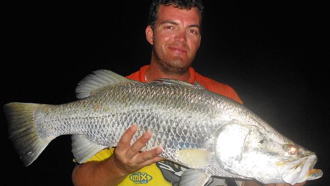 Lucas Pel spent Xmas in a tinnie with his dad Tim down at the mouth of the South Alligator... catching a few quality barra, including this 82cm silver fish on a popper