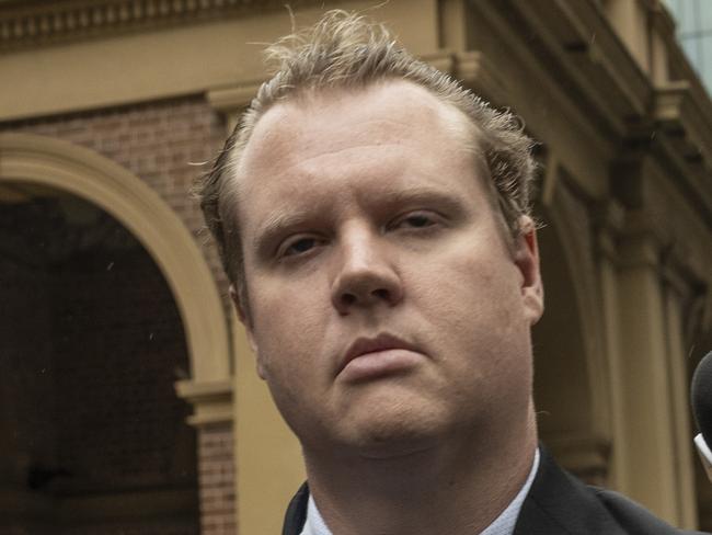 SYDNEY, AUSTRALIA - NewsWirePhotos - Thursday, 28 November 2024: Kristian White pictured behind his lawyers exiting Supreme Court after a bail reviewCrown making a detention application after a NSW Police officer who fatally tasered Clare Nowland in an aged care facility was found guilty of the manslaughter of the 95-year-old great-grandmother.Picture: NewsWire/ Monique Harmer