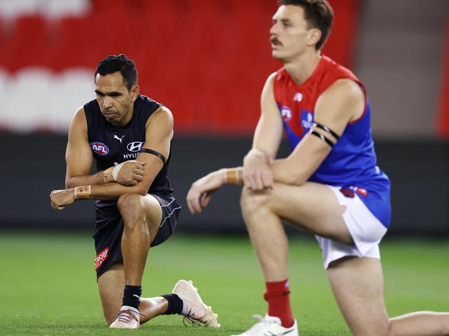 Eddie Betts and Jake Lever take a knee in support of Black Lives Matter. Picture: Michael Klein