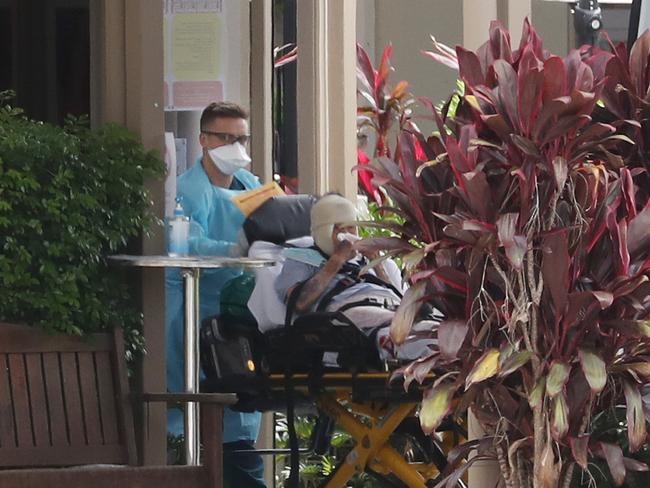 An elderly man was loaded into an ambulance during this morning emergency meeting. Picture: Annette Dew