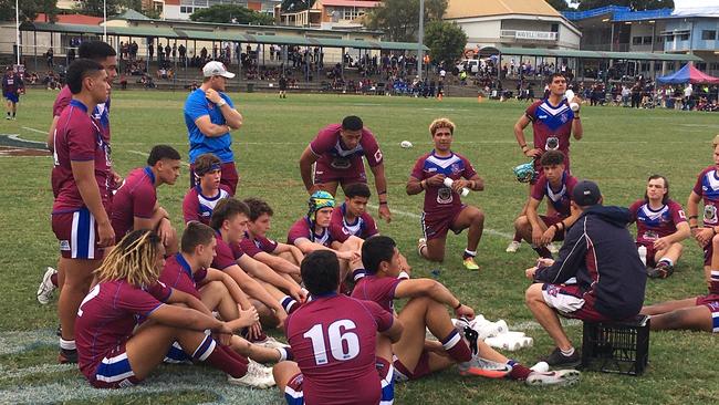 Wavell SHS reserves take in the halftime talk.