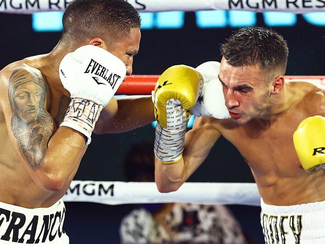 LAS VEGAS, NEVADA - JUNE 23: In this handout image provided by Top Rank, Joshua Franco punches Andrew Moloney during their WBA Super-Flyweight World Title fight at MGM Grand Conference Center Grand Ballroom on June 23, 2020 in Las Vegas, Nevada. (Photo by Mikey Williams/Top Rank via Getty Images)