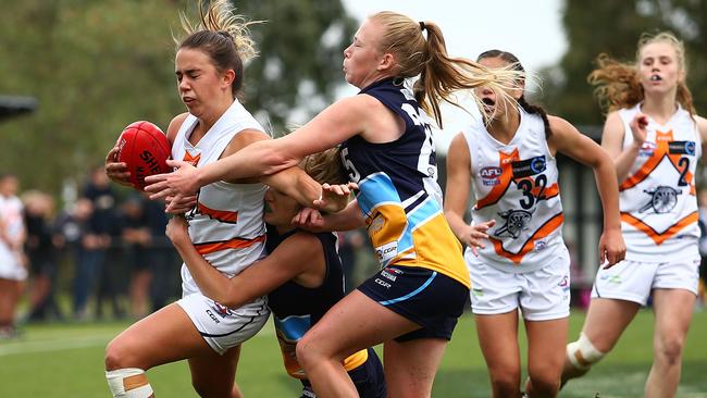 Chloe Molloy tries to shrug a tackle during Calder Cannons’ win over Bendigo on Friday. Picture: Jack Thomas.