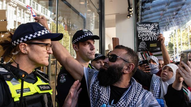 Pro-Palestine protesters gather in front of a Zara store in Melbourne during a rally against the ongoing war in Gaza. Picture: NCA NewsWire/Diego Fedele