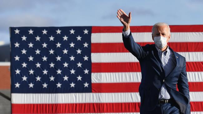 Democratic presidential nominee Joe Biden waves to supporters before speaking at a Drive-In rally at Dallas High School, in Dallas, Pennsylvania. Picture: Angela Weiss / AFP