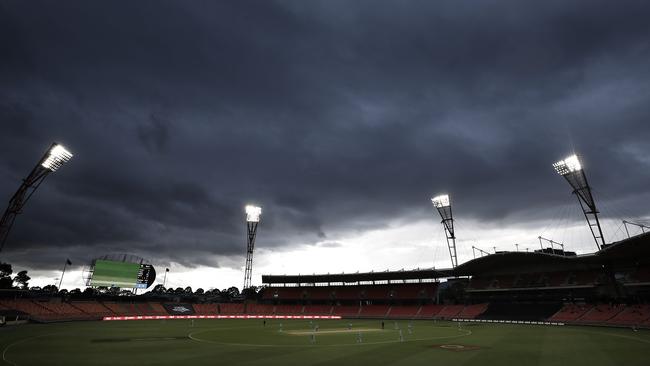 Storm clouds approach during the Women's Big Bash League WBBL match between the Brisbane Heat and the Hobart Hurricanes. Picture: Ryan Pierse/Getty Images