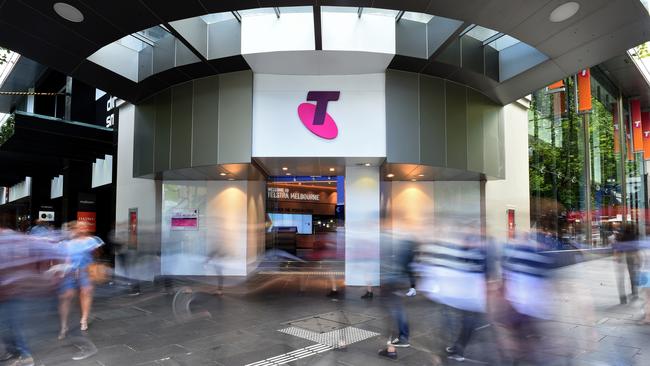 Pedestrians walk past a Telstra store in Melbourne. Picture: Bloomberg