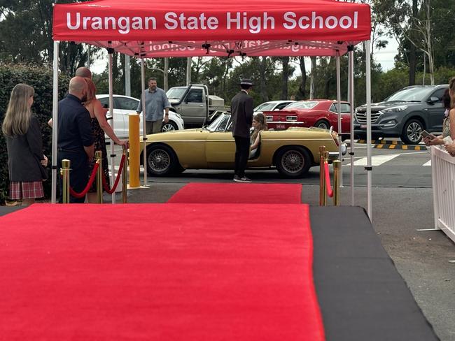 Students from Urangan State High School arrive at their formal.