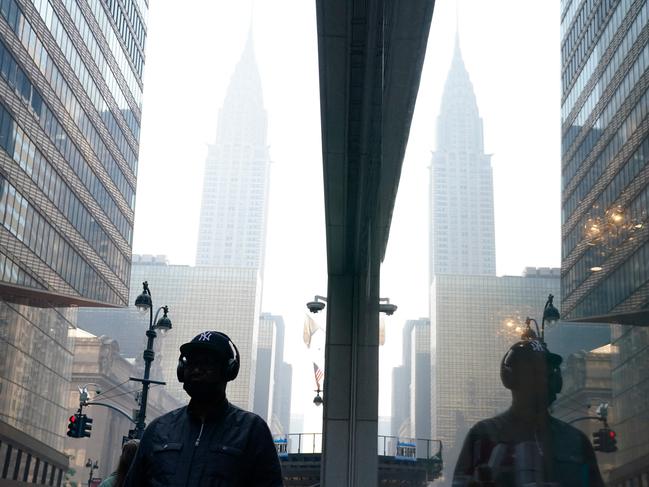 A person wears a mask during the morning peak hour June 8, 2023, in New York City. Picture: AFP