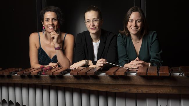 Embrace concert by Adelaide Symphony Orchestra. Percussionist Claire Edwardes, conductor Elena Schwarz and composer Anne Cawrse prepare for premiere of marimba concerto Dare to Declare. Picture: Shane Reid