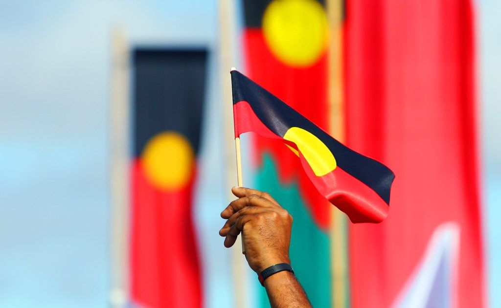 ROK-march09c Aboriginal flags fly during the Naidoc Week march through Rockhampton CHRIS ISON CI09-0710-5. Picture: Chris Ison