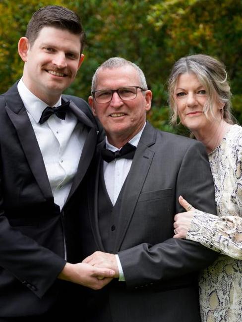 Mr Cox with his wife Marianne and son Jared.