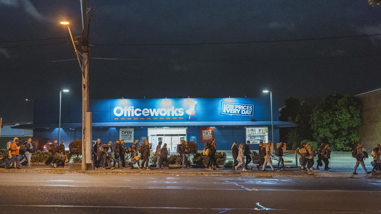 Participants walk through the Toowoomba CBD as part of the Base Services' 2021 Homeless for a Night sleepout.